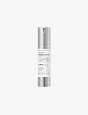 Skincare serum bottle with silver cap and white label on a white background